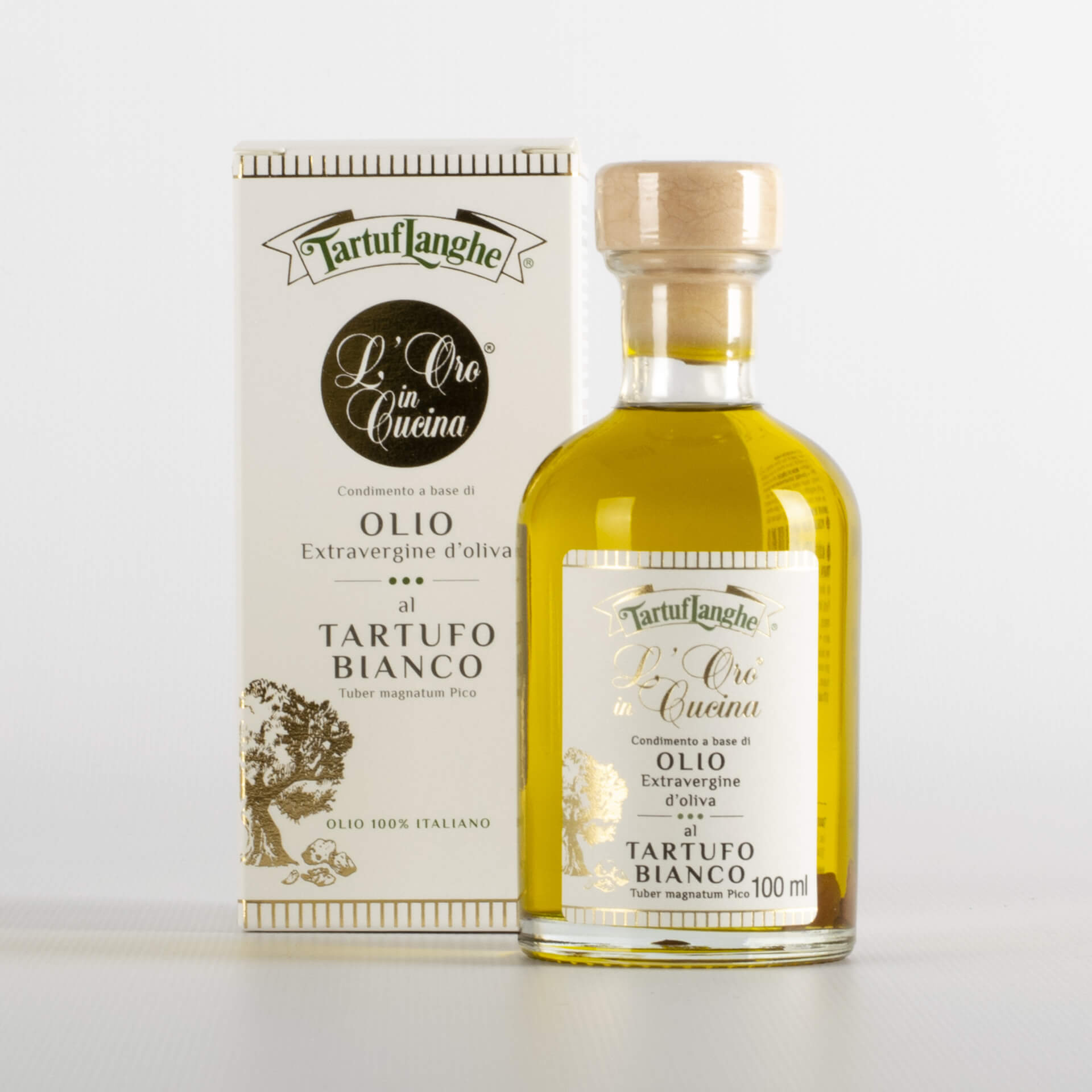 Extra virgin olive oil with white truffle slices Oro in Cucina