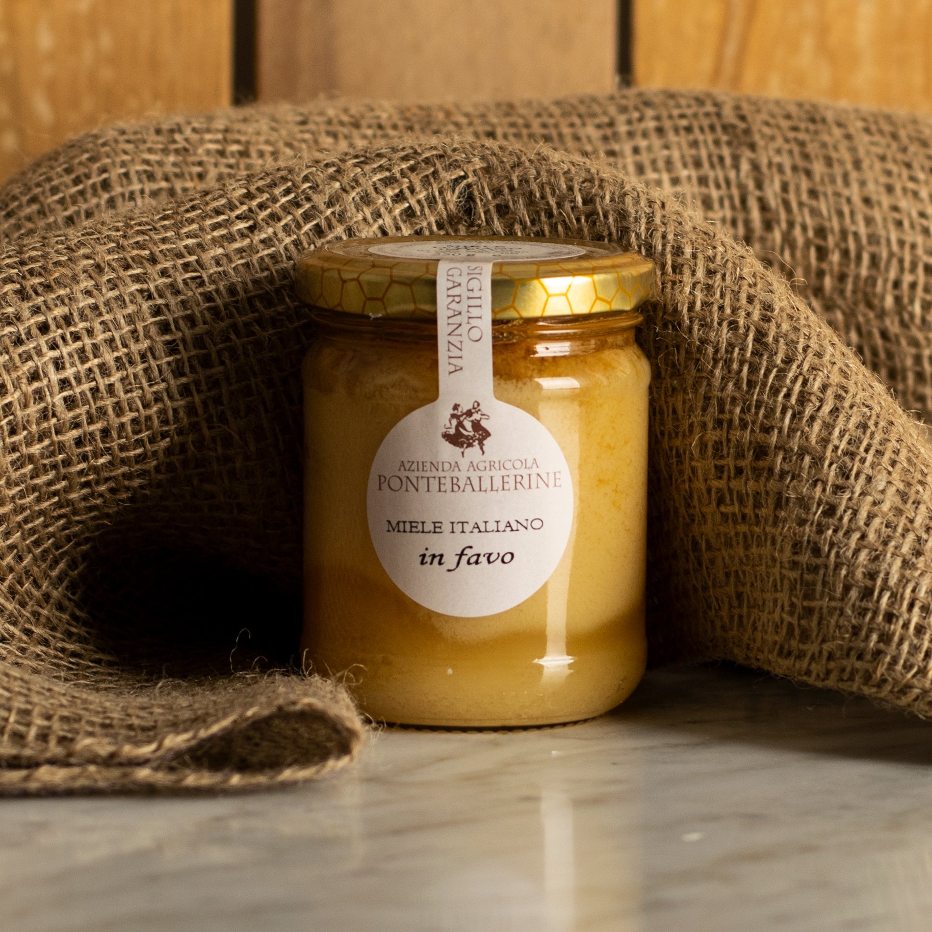 Miele Acacia con favo 250g Miele Acacia con favo 250g