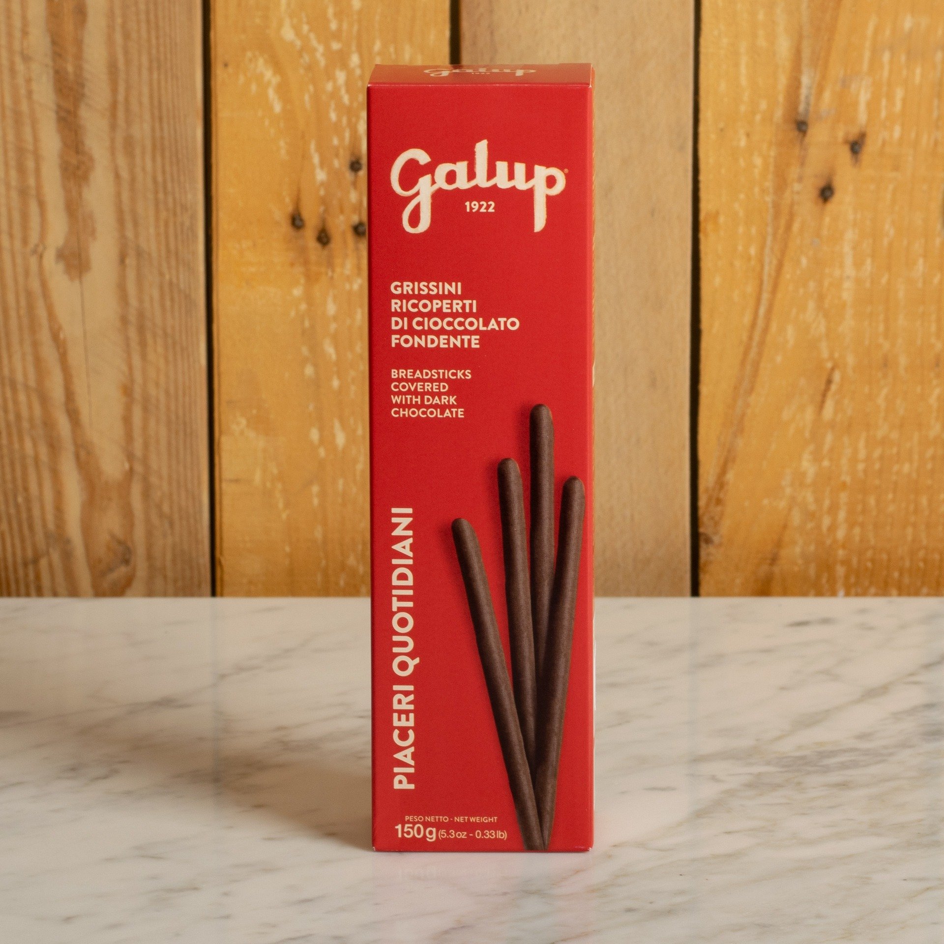 Mit dunkler Schokolade überzogene Grissini