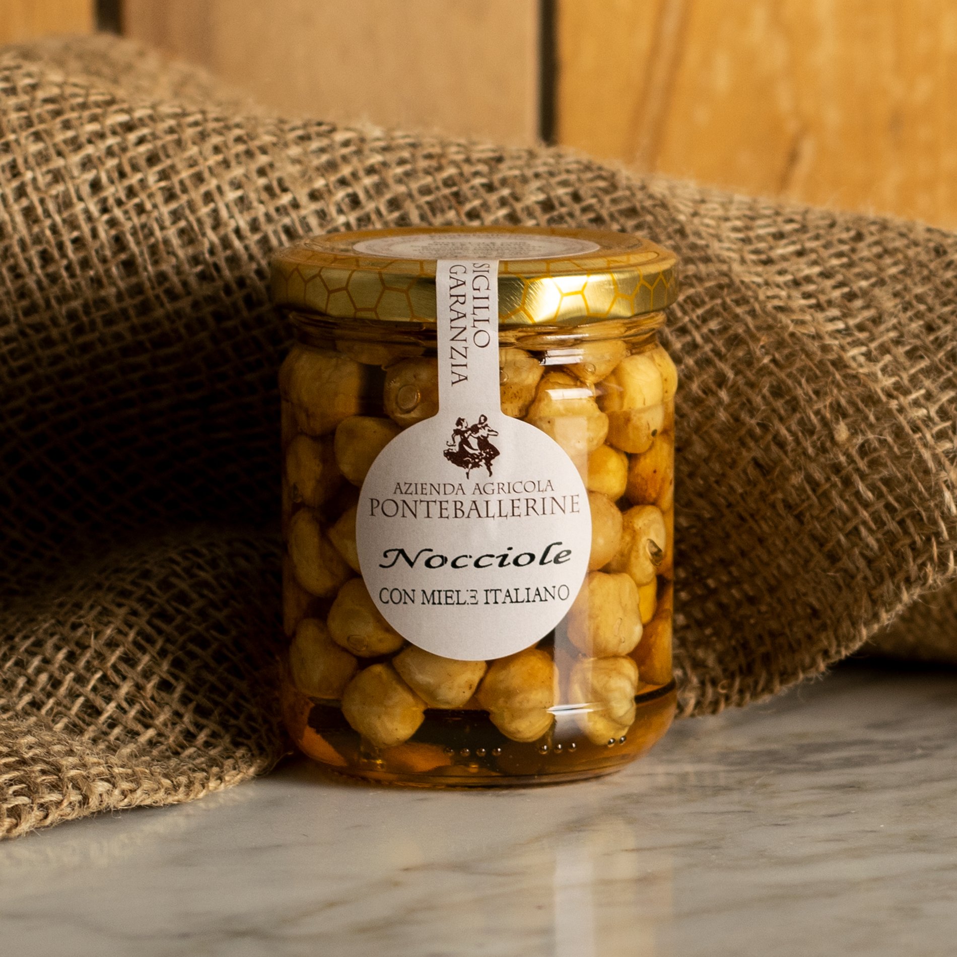 Hazelnuts in Acacia Honey 225g