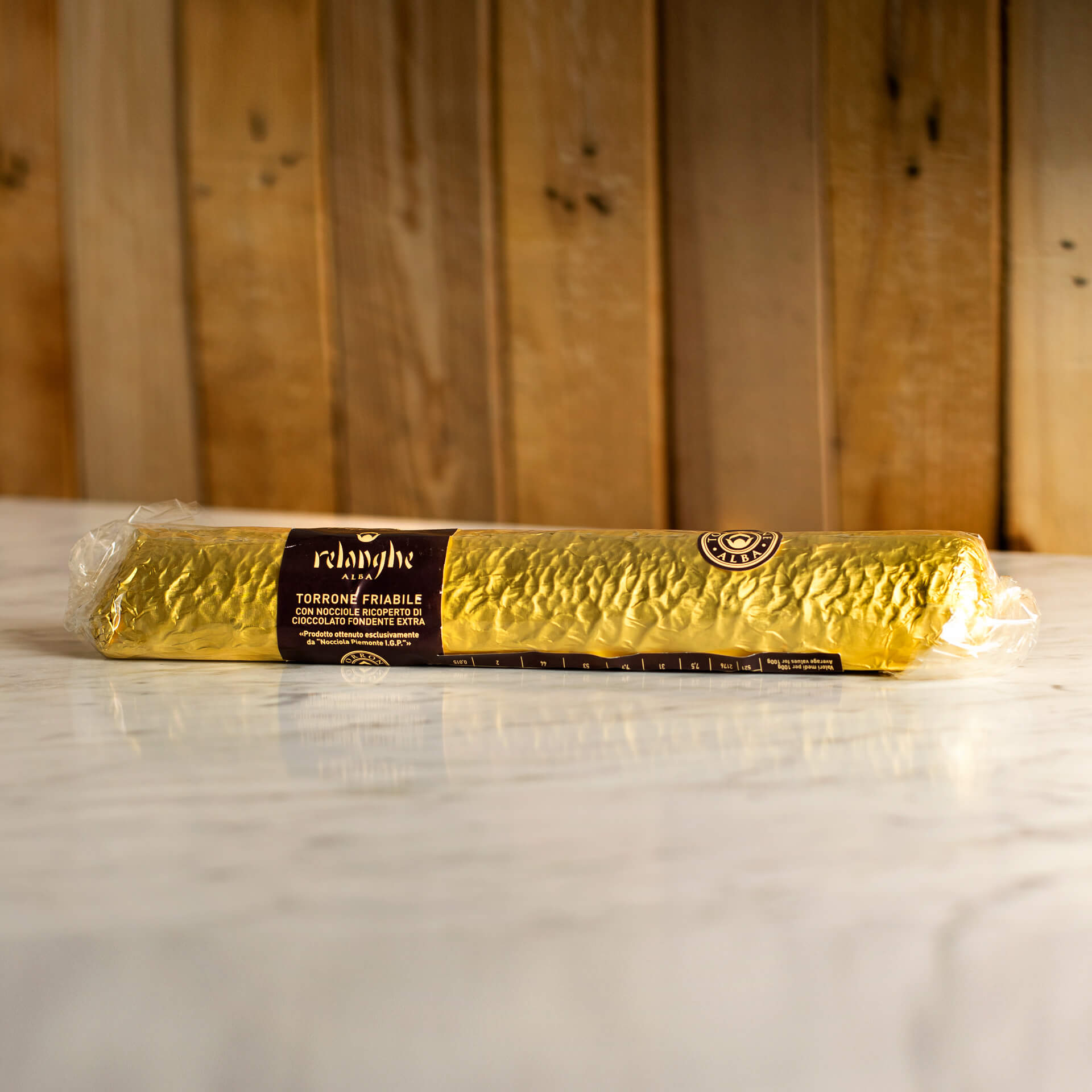 Tronchetto Torrone con nocciole Piemonte IGP ricoperto 250g Tronchetto Torrone con nocciole Piemonte IGP ricoperto 250g