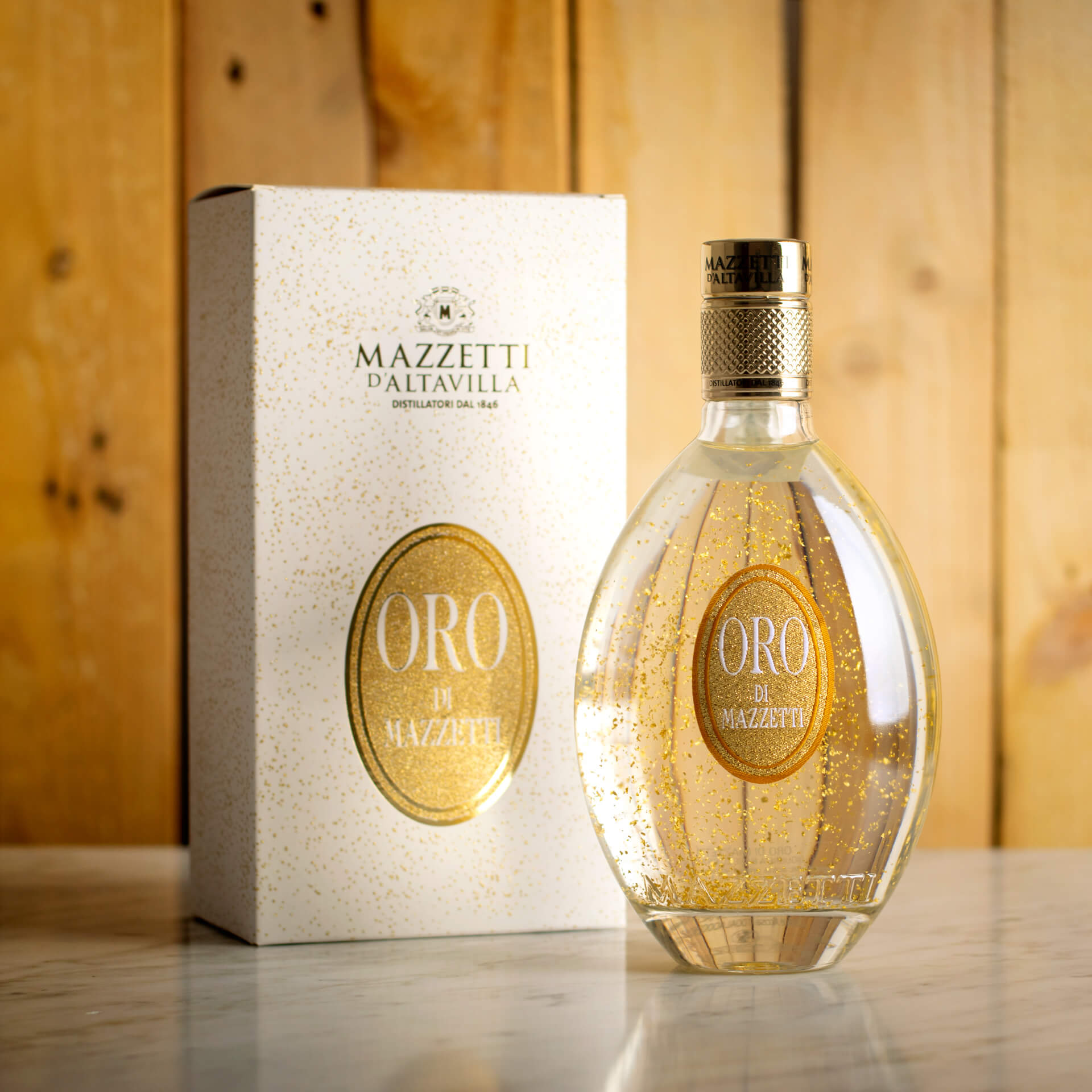 Oro Mazzetti Likör auf Basis von Grappa – mit Schachtel Oro Mazzetti Likör auf Basis von Grappa – mit Schachtel