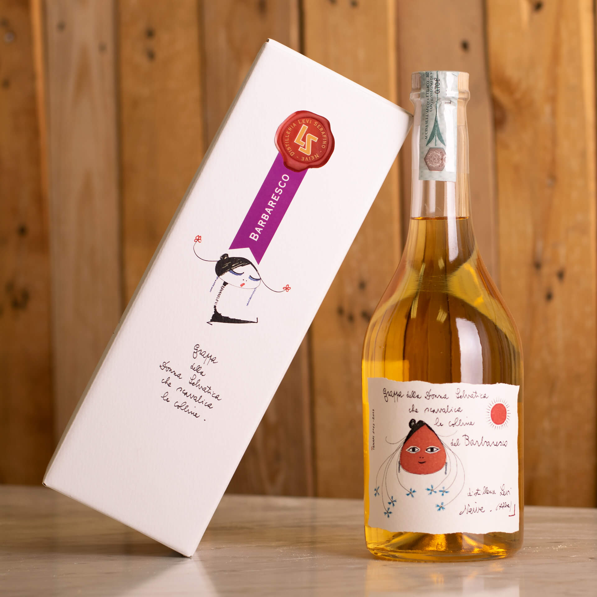 Grappa riserva di Barbaresco della donna selvatica che scavalica le colline Grappa riserva di Barbaresco della donna selvatica che scavalica le colline