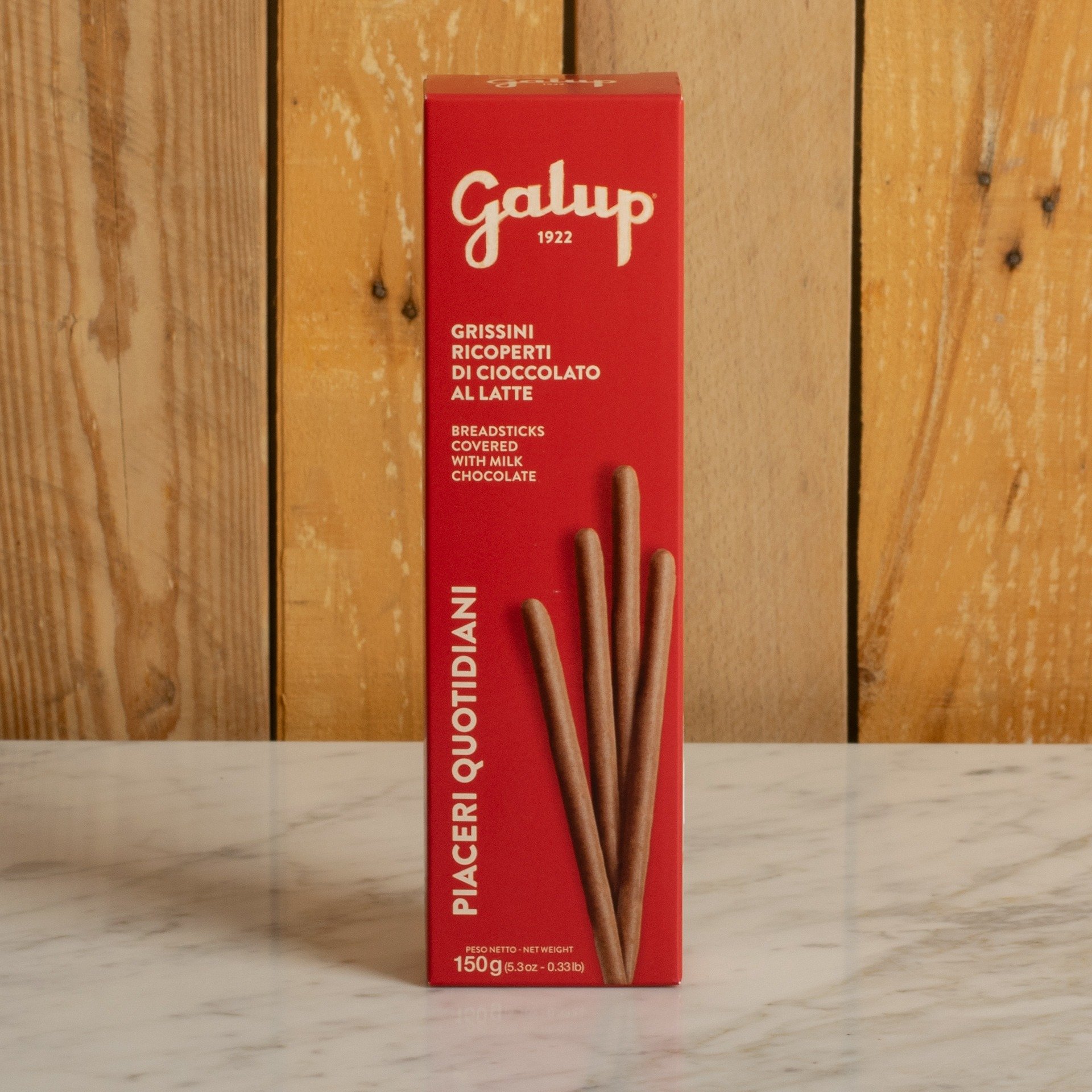 Mit Milchschokolade überzogene Brotstangen