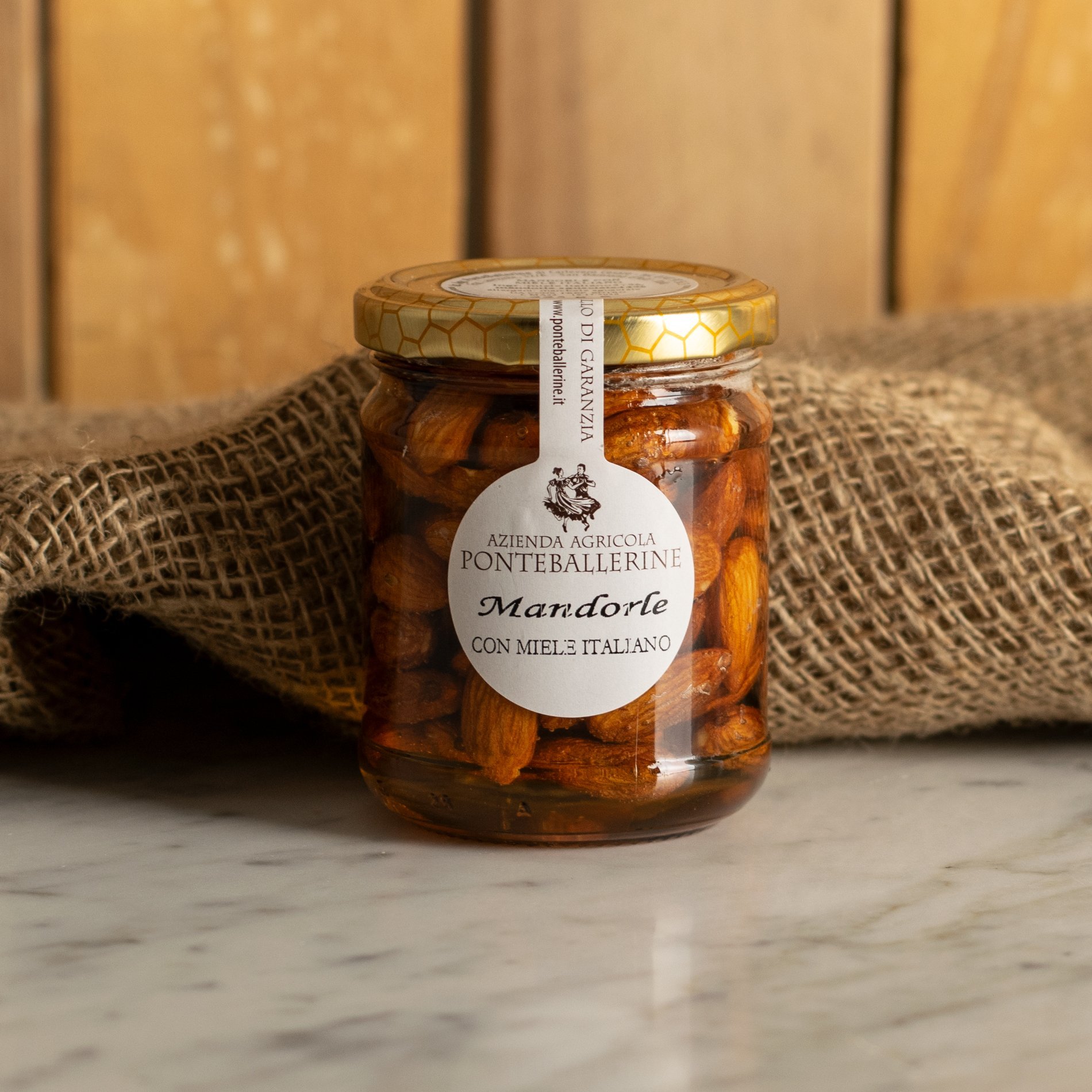 Mandorle in miele d'acacia 225g Mandorle in miele d'acacia 225g